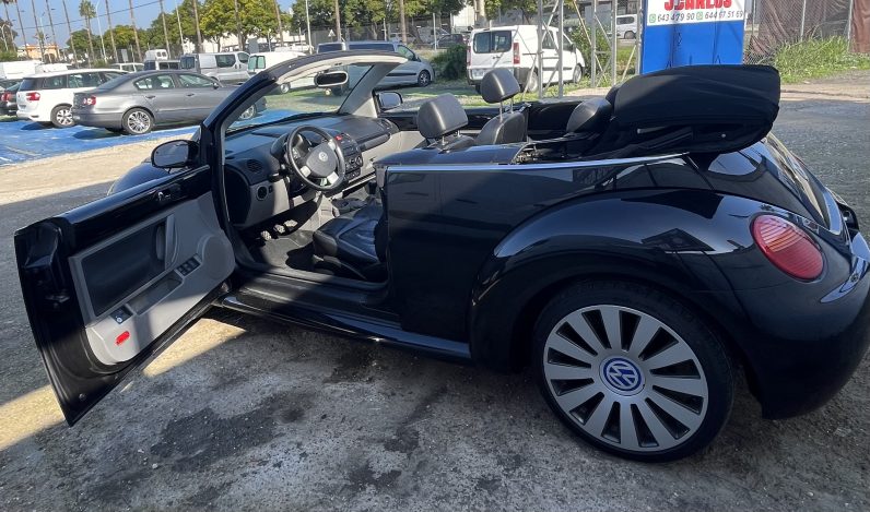 
								Volkswagen New Beetle full									