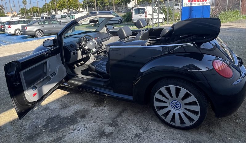 
								Volkswagen New Beetle full									